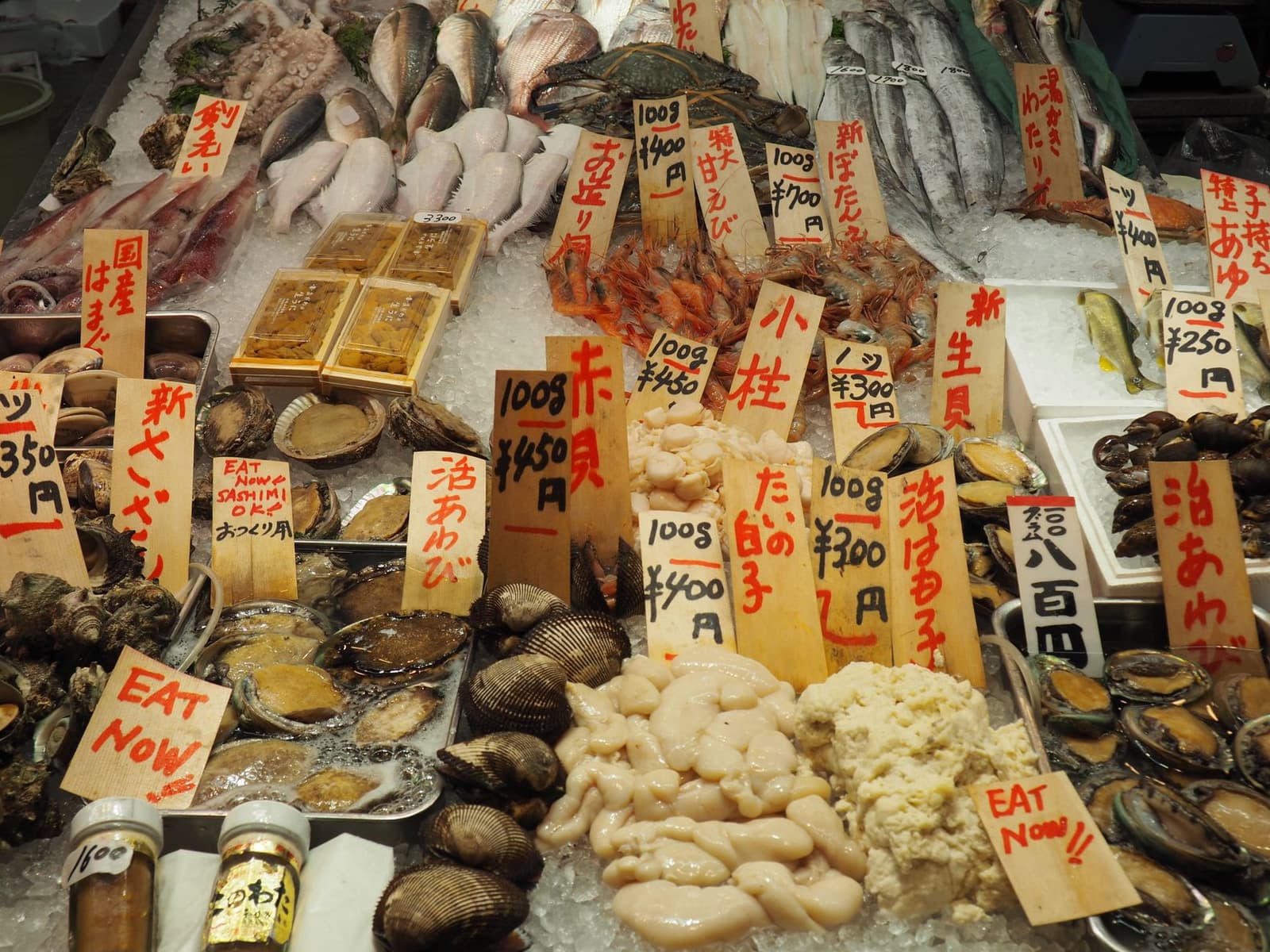 Fresh seafood on ice at a Japanese market stall