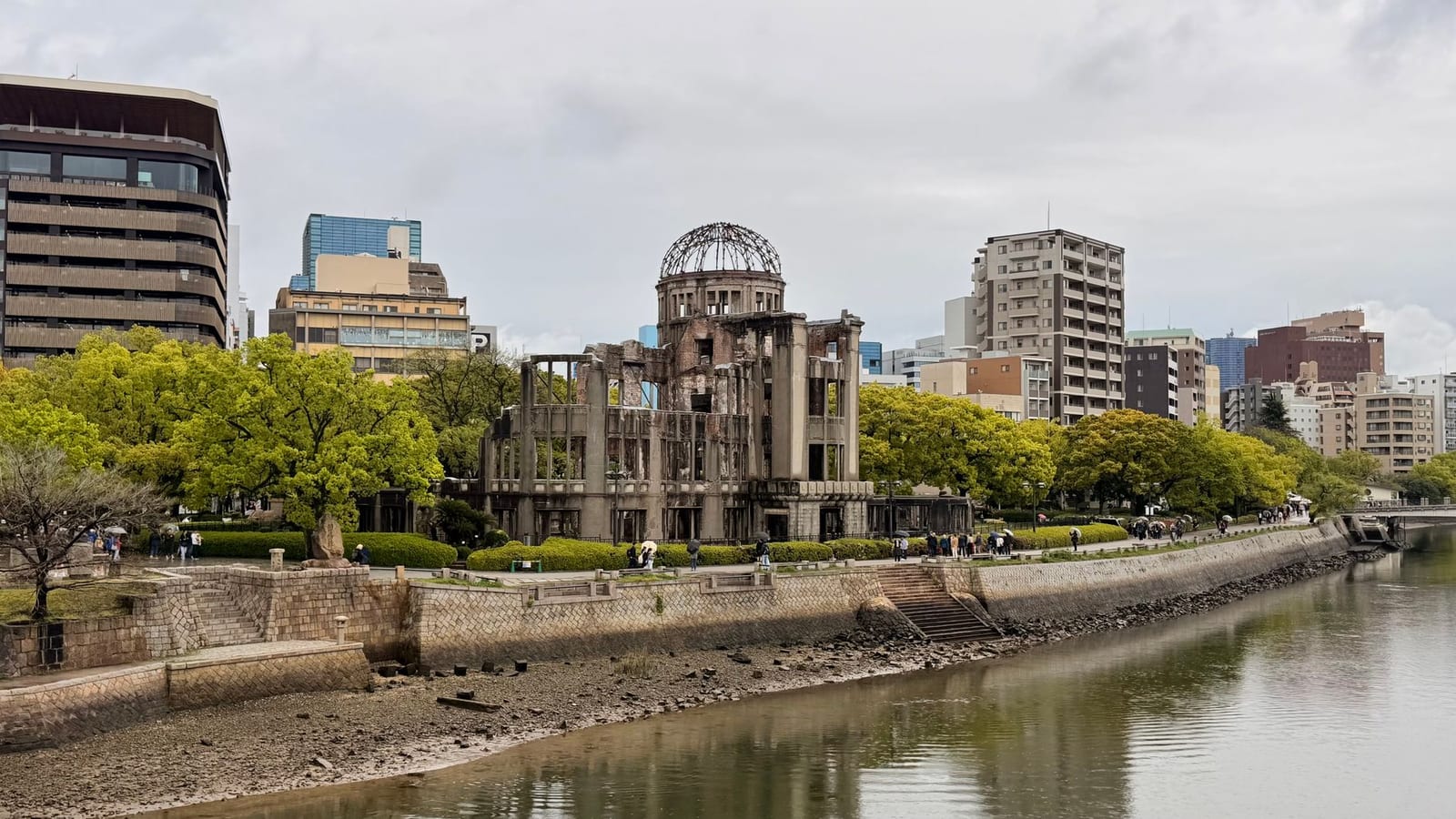 The Atomic Bomb Dome standing beside the river at Hiroshima Peace Memorial Park