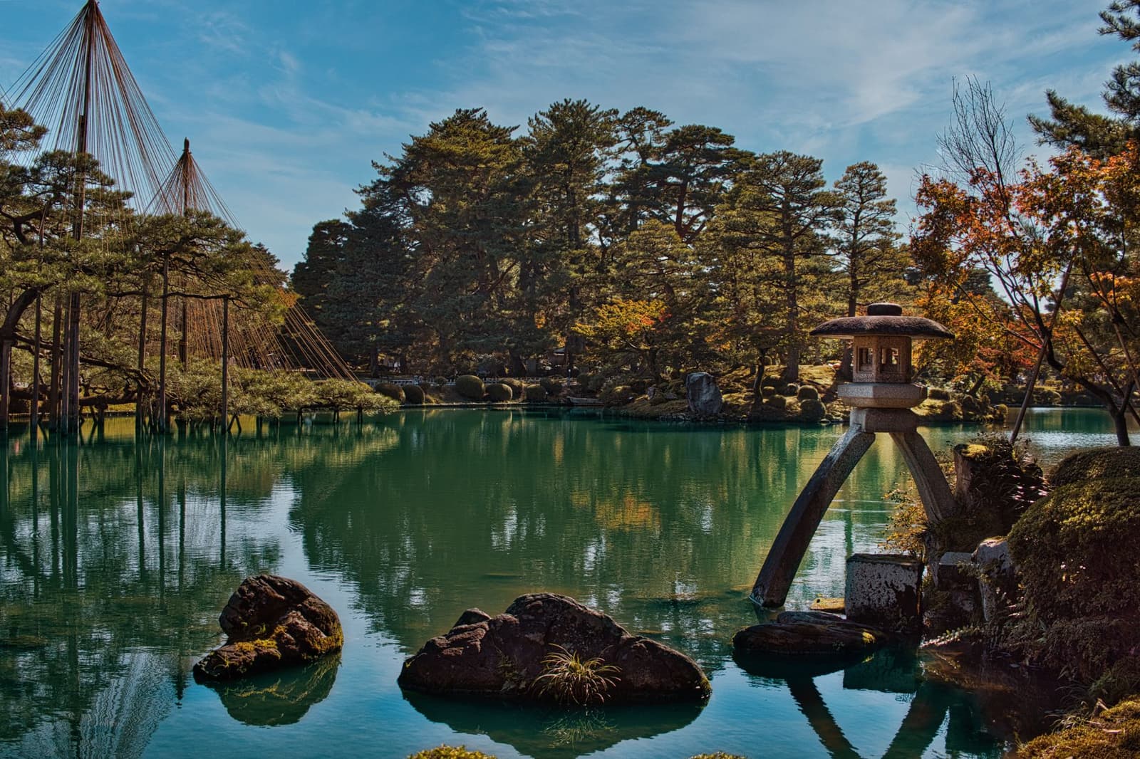 Kenroku-en garden at Kanazawa with pines, stone lanterns and pond