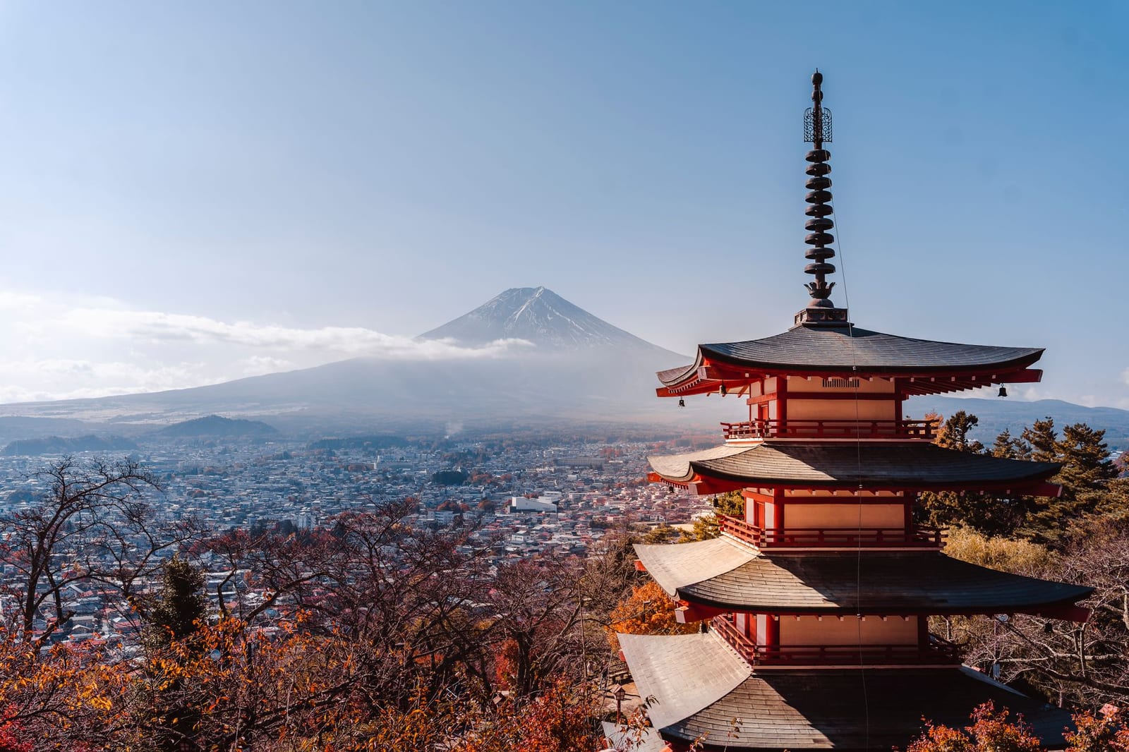 Mount Fuji seen beyond the Chureito Pagoda with autumn foliage below