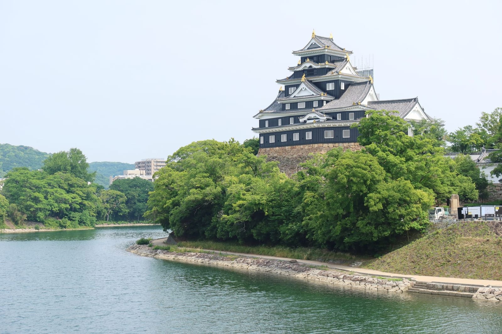 Okayama Castle beside the Asahi River, surrounded by greenery