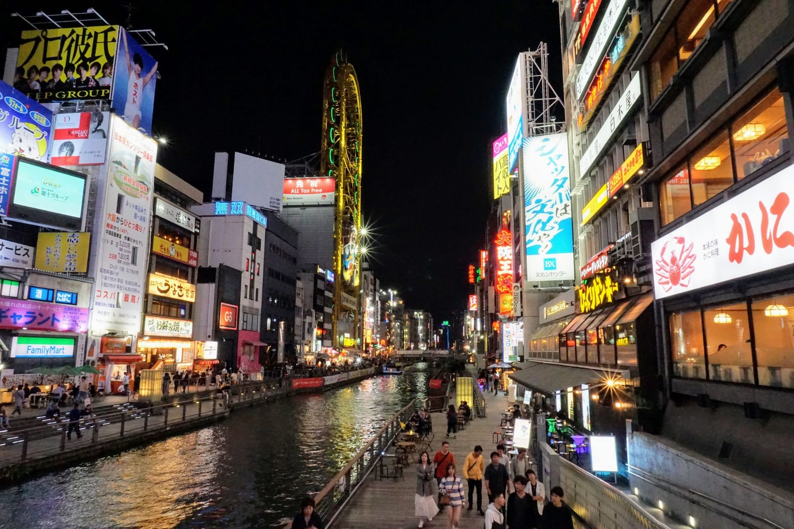 Illuminated signage and canal frontage at Dotonbori, Osaka, after dark